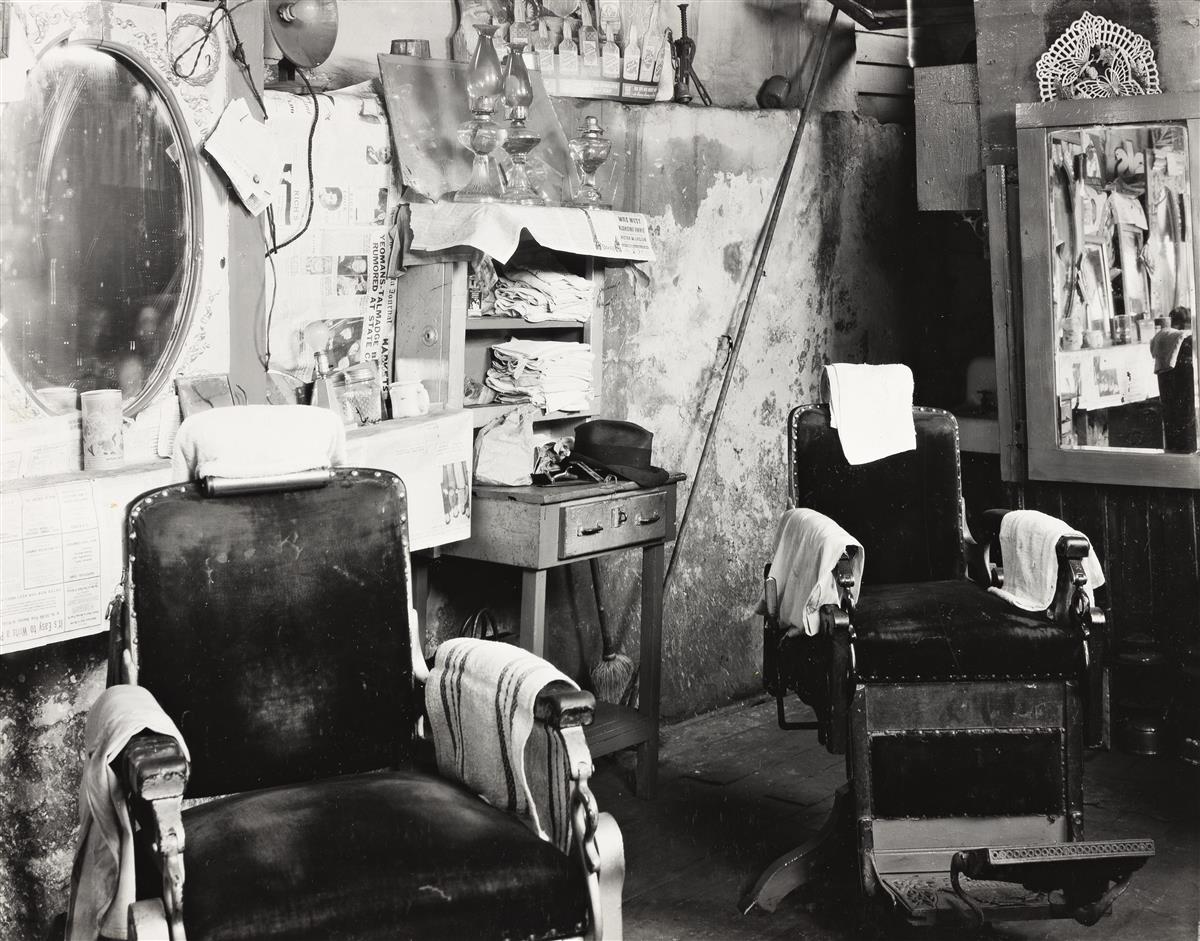 WALKER EVANS (1903-1975) Negroes Barbershop Interior, Atlanta, Georgia.